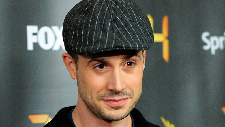 Freddie Prinze Jr. in striped cap