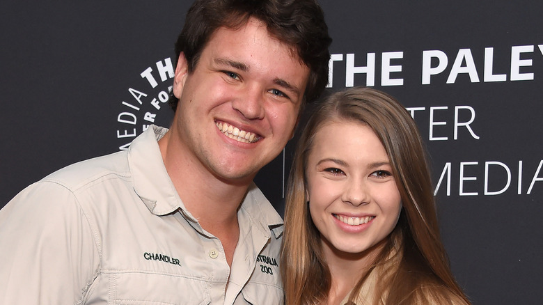 Bindi Irwin and Chandler Powell pose 