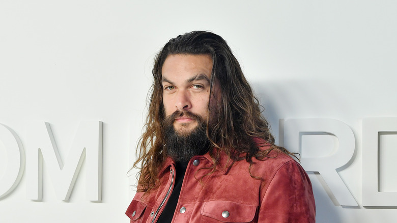 Jason Momoa poses 