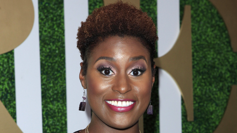 Issa Rae with purple eye shadow