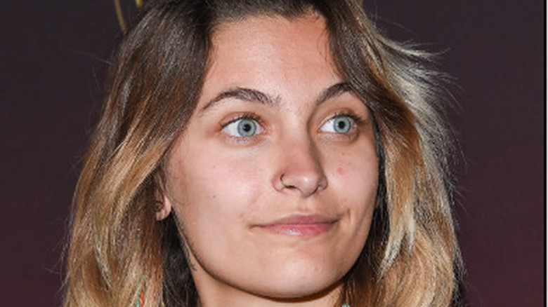 Paris Jackson looking off to the side blue eyes