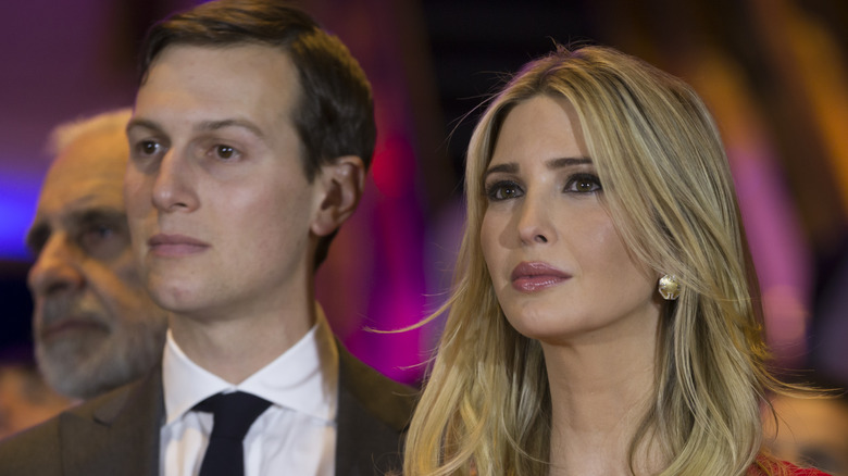 Ivanka Trump and Jared Kushner stand next to each other