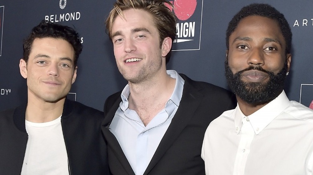 Rami Malek, Robert Pattinson and John David Washington posing together