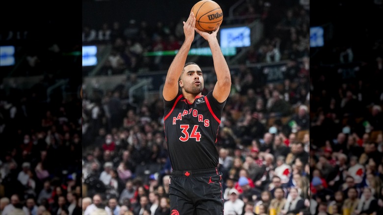 Jontay Porter shooting a basketball