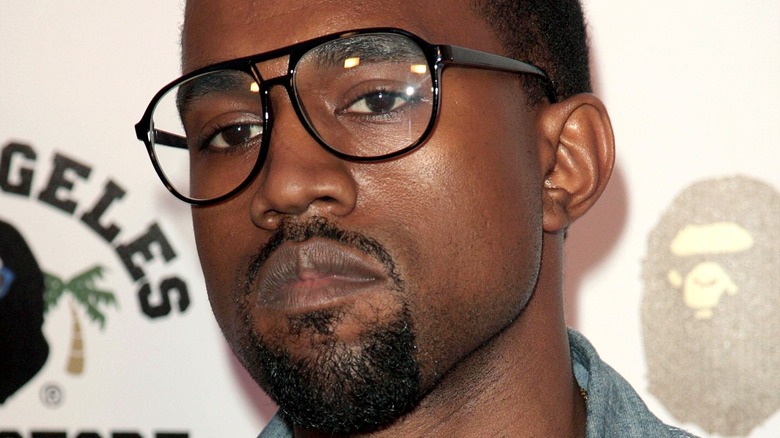 Kanye West wearing glasses