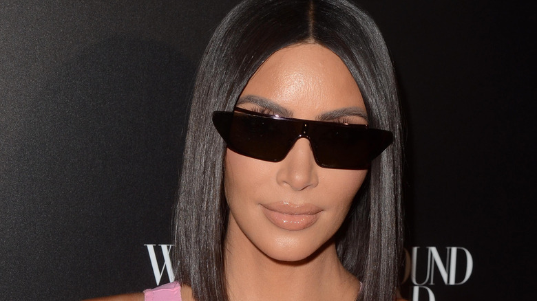 Kim Kardashian wearing dark glasses