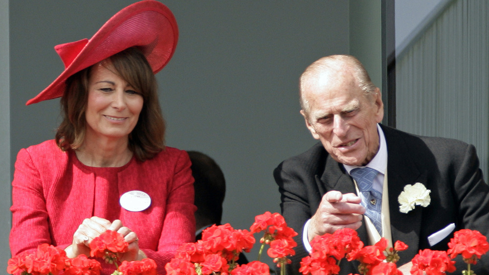 Carole Middleton and Prince Philip chatting 