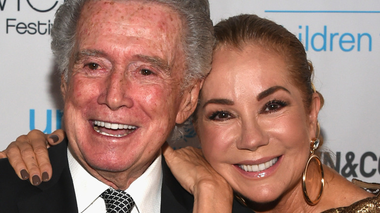 Kathie Lee Gifford and Regis Philbin posing