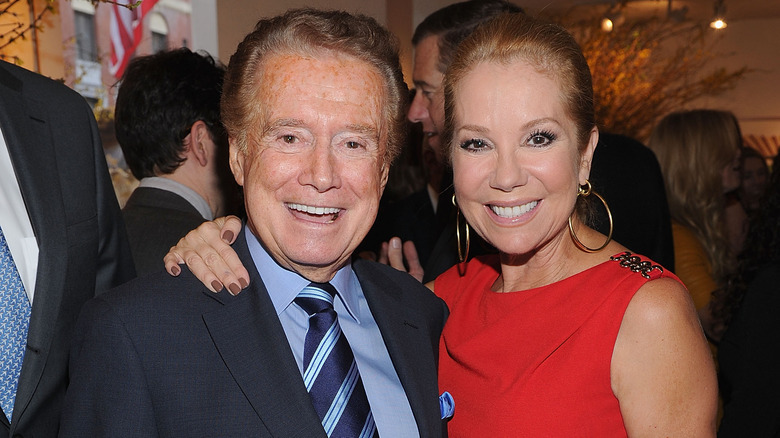 Kathie Lee Gifford and Regis Philbin smiling