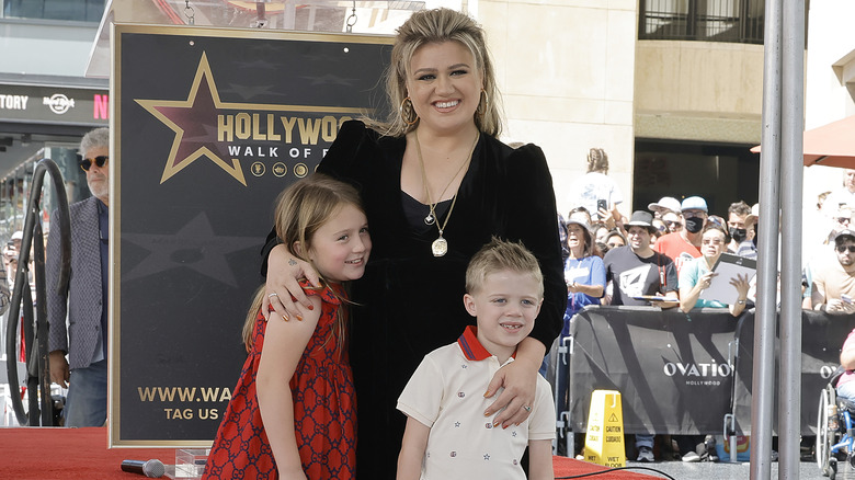 Kelly Clarkson poses with her children