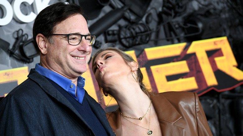 Kelly Rizzo and Bob Saget posing