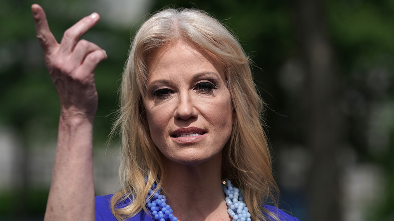 Kellyanne Conway holding fingers up