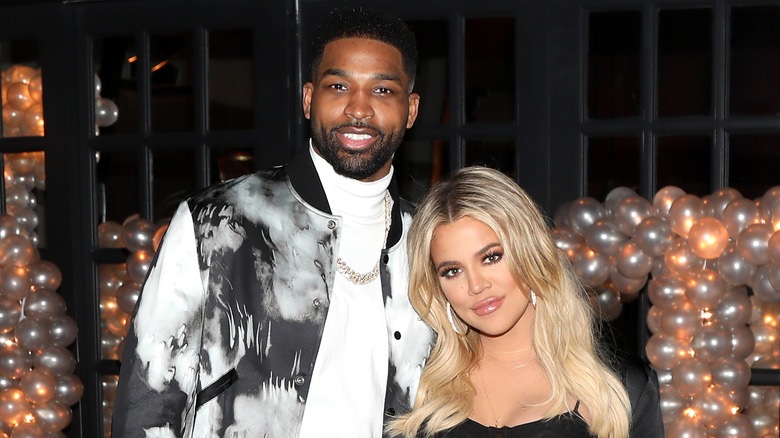 Tristan Thompson and Khloé Kardashian smiling