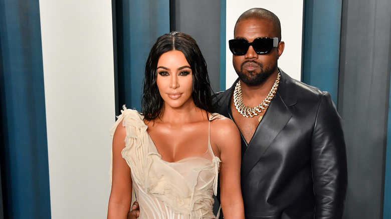 Kim Kardashian West and Kanye West arriving at the 2020 Vanity Fair Oscar Party