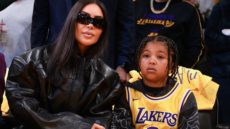 Kim Kardashian and Saint West courtside