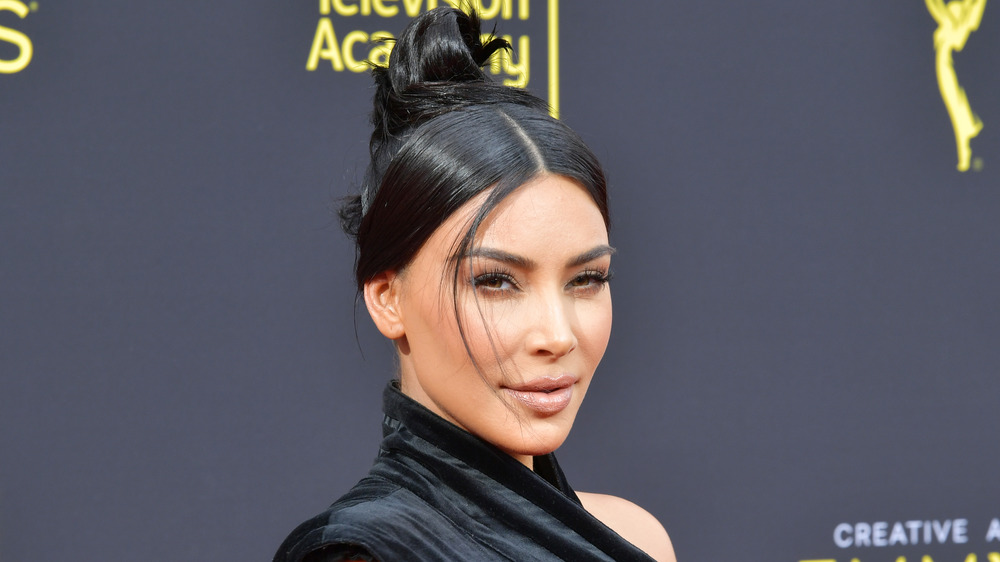 Kim Kardashian with hair in a bun 