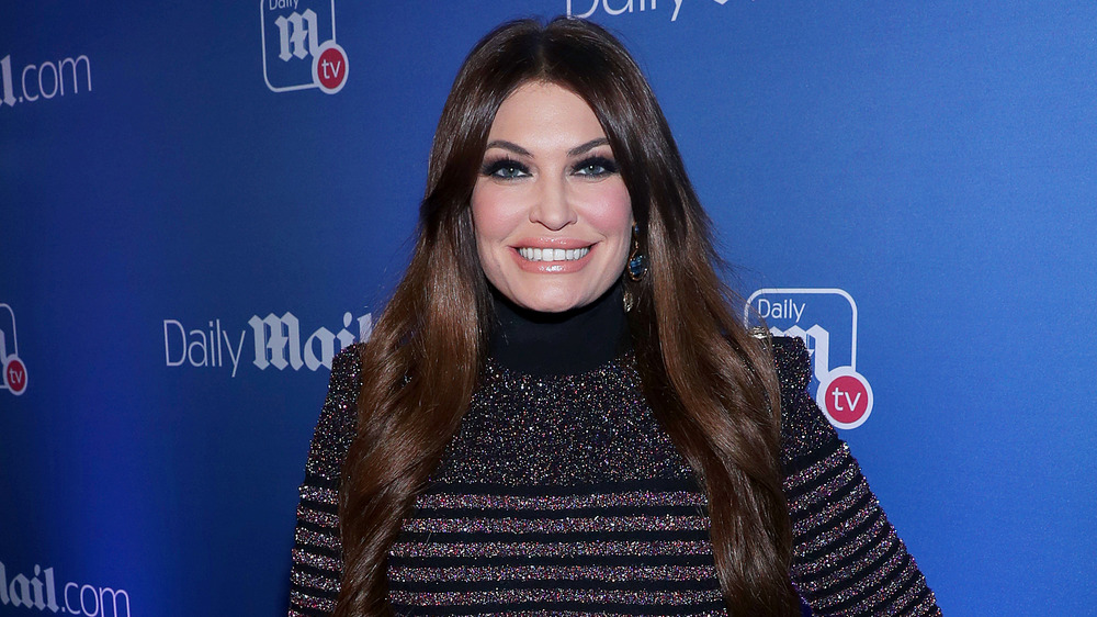 Kimberly Guilfoyle smiling on the red carpet