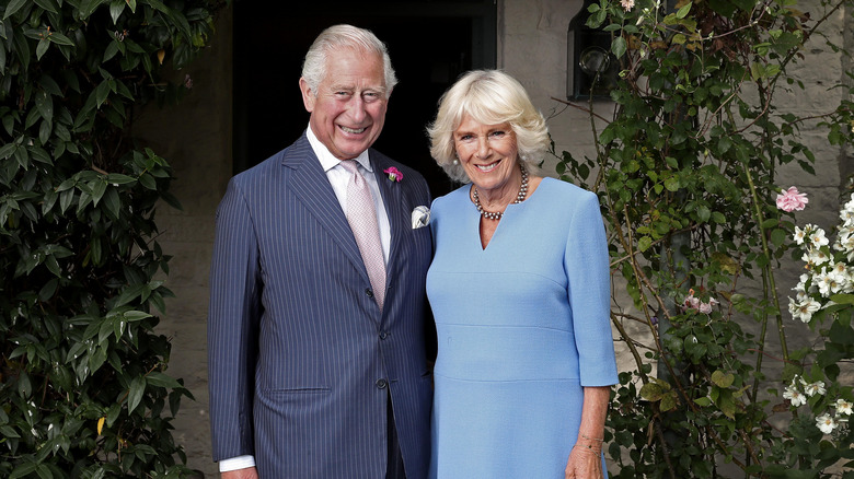 King Charles and Camilla Parker Bowles smiling