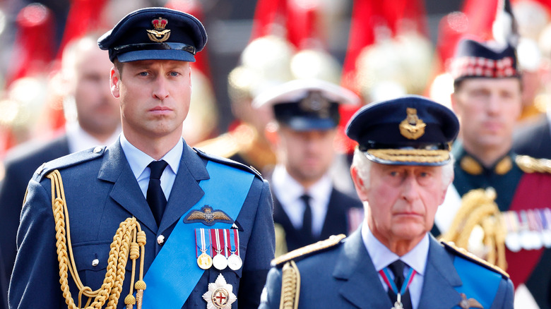 Prince William and King Charles in uniform