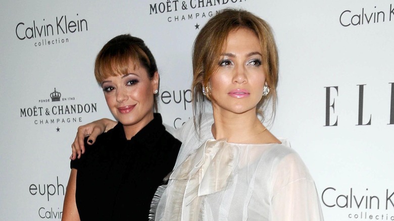 Leah Remini and Jennifer Lopez pose on red carpet