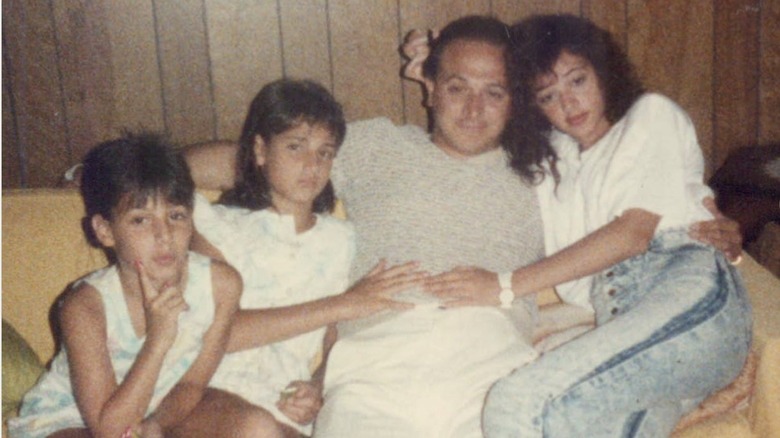 Leah Remini posing with George Remini and family