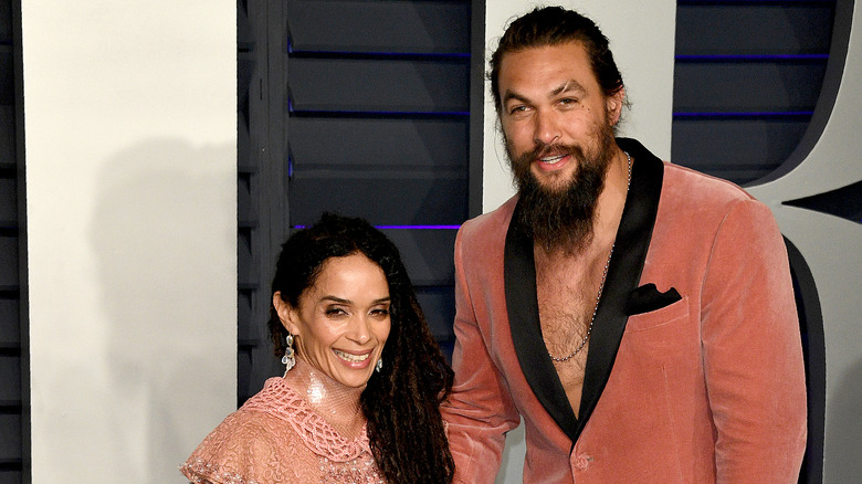 Lisa Bonet and Jason Momoa posing