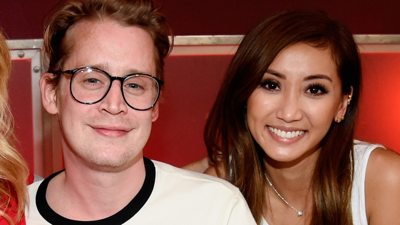 Brenda Song and Macaulay Culkin posing