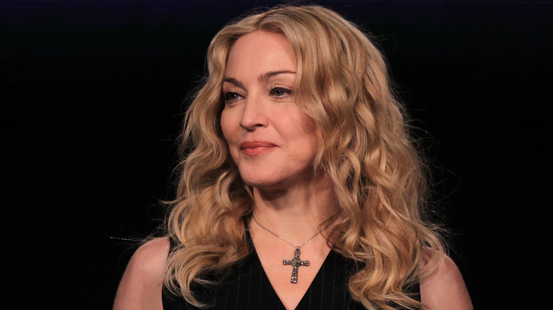 Madonna wearing a cross