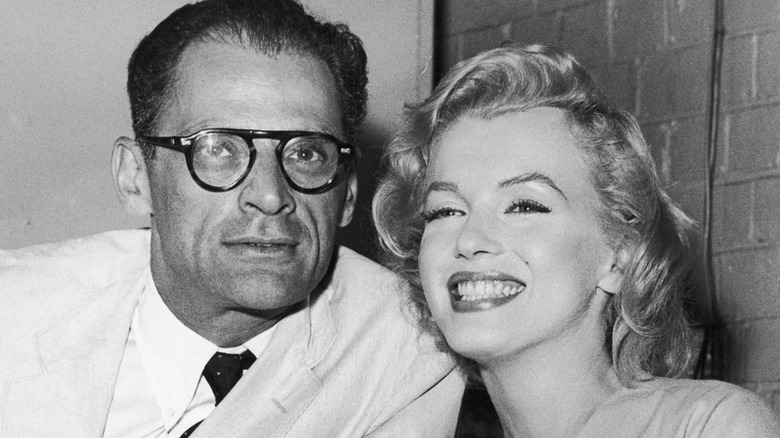 Marilyn Monroe smiling with Arthur Miller