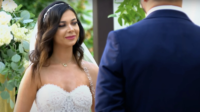 alyssa and chris married at first sight posing together