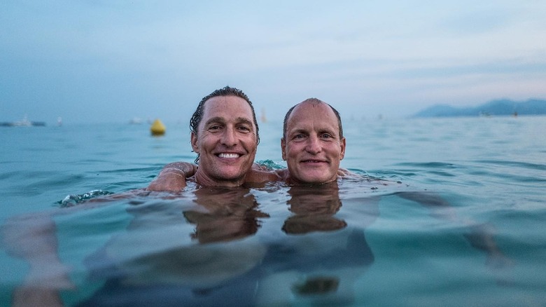 Matthew McConaughey and Woody Harrelson smiling