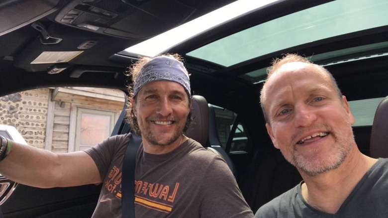 Matthew McConaughey and Woody Harrelson smiling