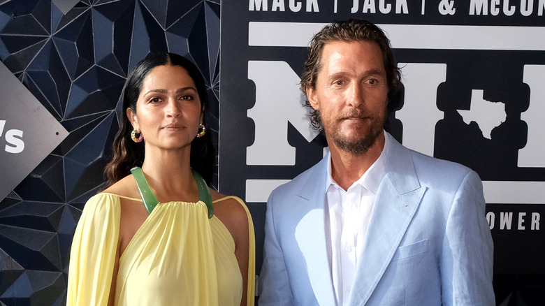 Camila Alves and Matthew McConaughey posing