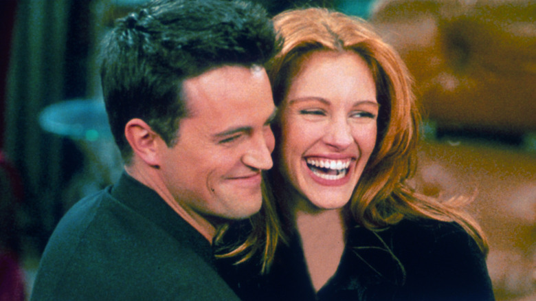 Matthew Perry and Julia Roberts hug