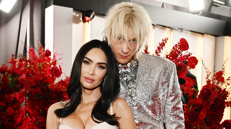 Megan Fox and Machine Gun Kelly pose 