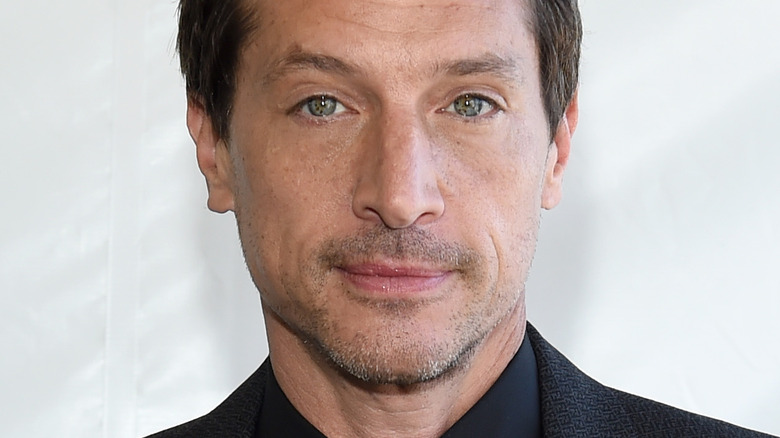 Simon Rex looking at camera