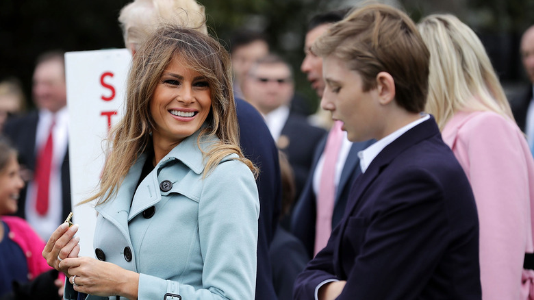 Melania and Barron Trump posing