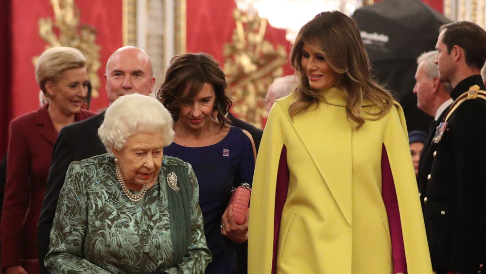 Melania Trump talking with The Queen