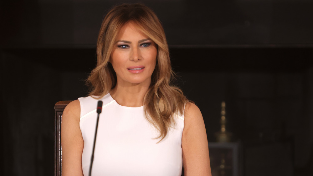 Melania Trump speaks into mic