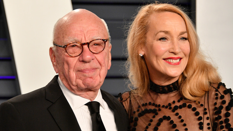 Rupert Murdoch posing with Jerry Hall