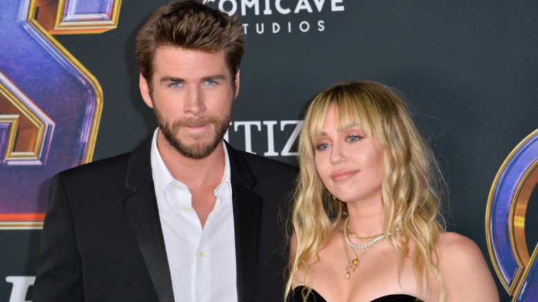 Miley Cyrus and Liam Hemsworth at the Avengers premiere