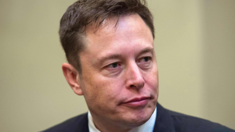 Elon Musk with a serious expression