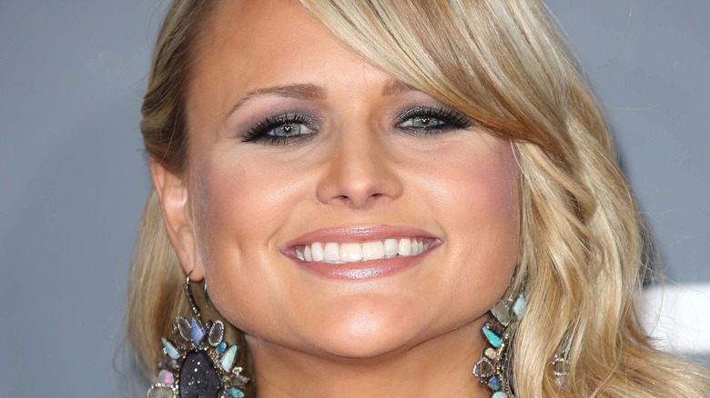 Miranda Lambert big smile wearing huge earrings