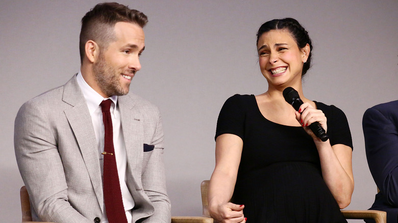 Ryan Reynolds and Morena Baccarin laughing