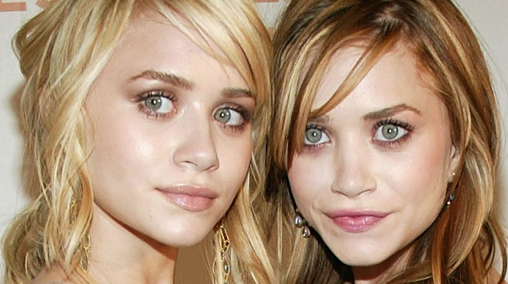 Mary Kate and Ashley Olsen attend a premiere