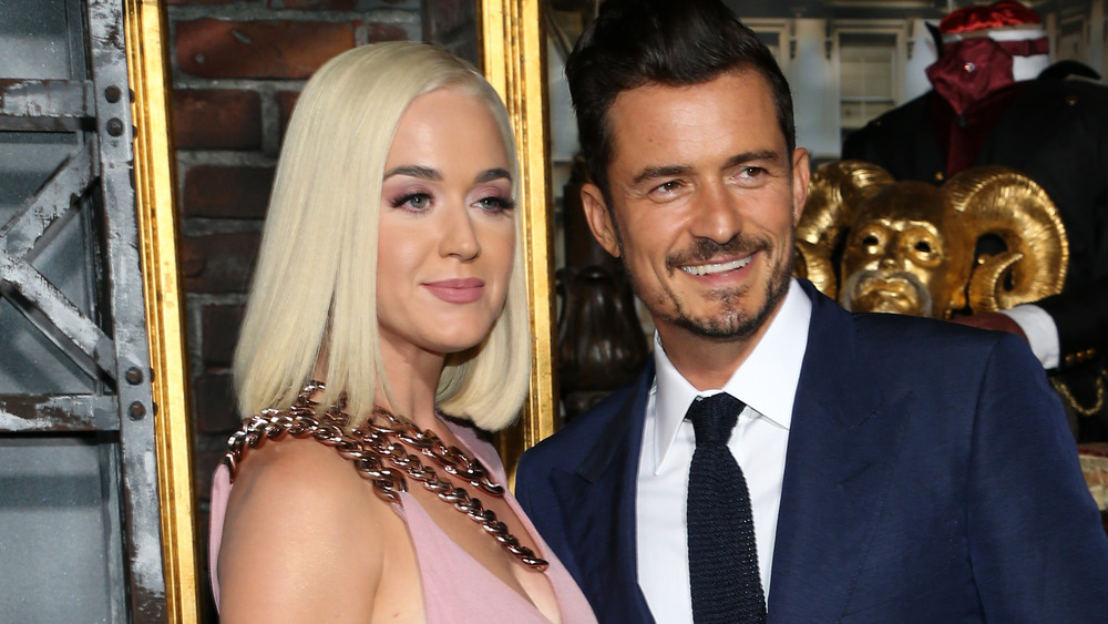 Katy Perry and Orlando Bloom, both smiling
