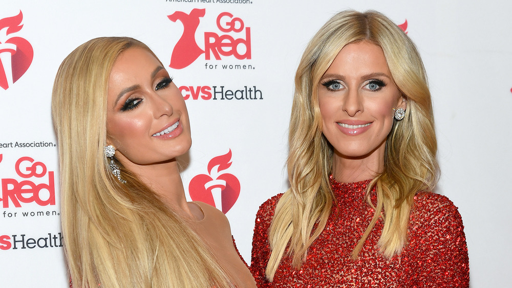 Paris Hilton smiling with sister Nicky Hilton