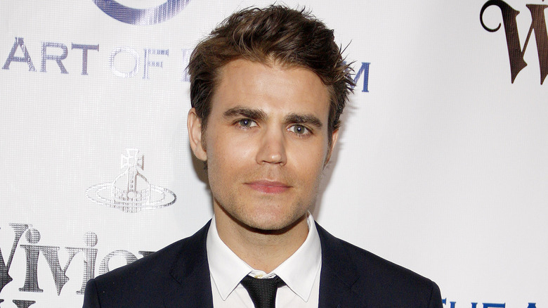 Paul Wesley wearing a suit