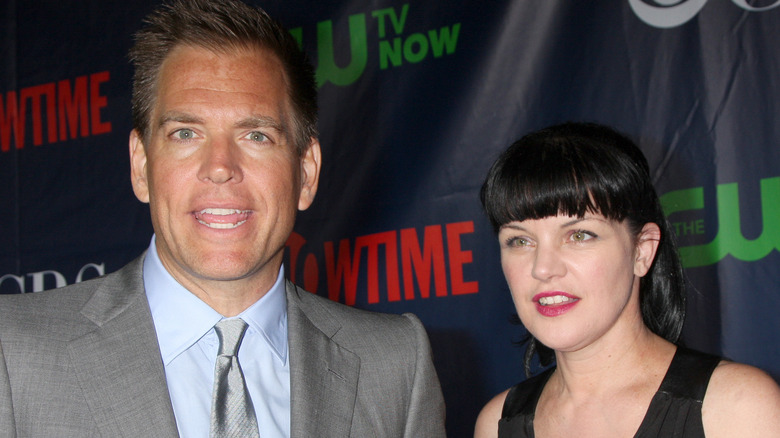 Michael Weatherly and Pauley Perrette posing