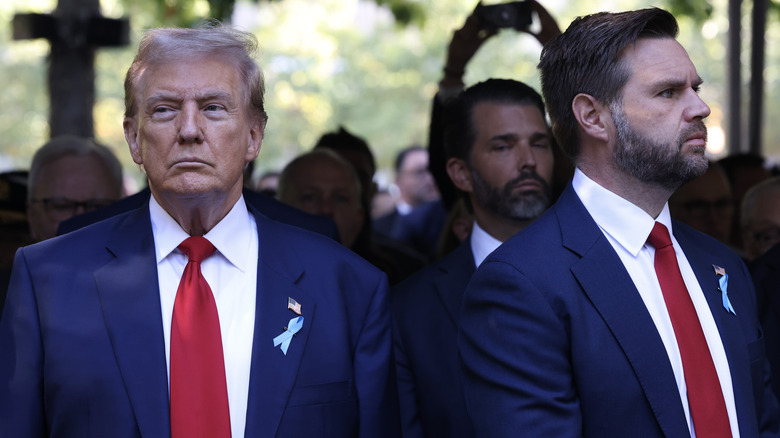 Donald Trump and JD Vance looking away from one another